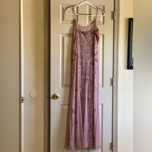 Beautiful rose colored Galena signature size 14 gown with intricate bead work.